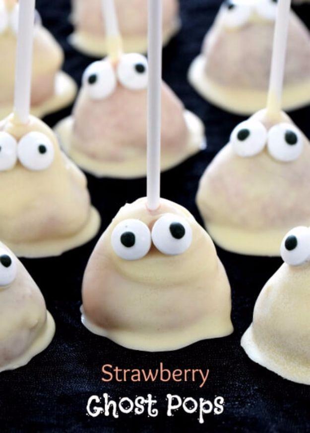 Homemade Halloween treat, kid-friendly spooky serving and creative Halloween recipe, featuring strawberry ghost pops