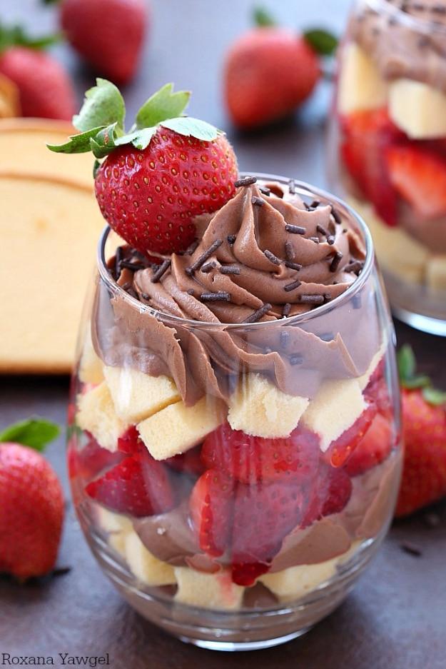 Chocolate strawberry parfait layered in a glass with pound cake and fresh berries, an easy no bake dessert
