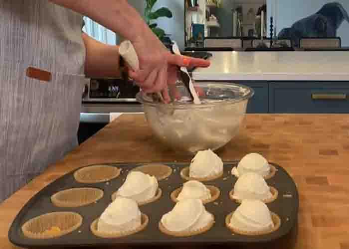 Making the cream cheese filling of the foolproof cheesecake