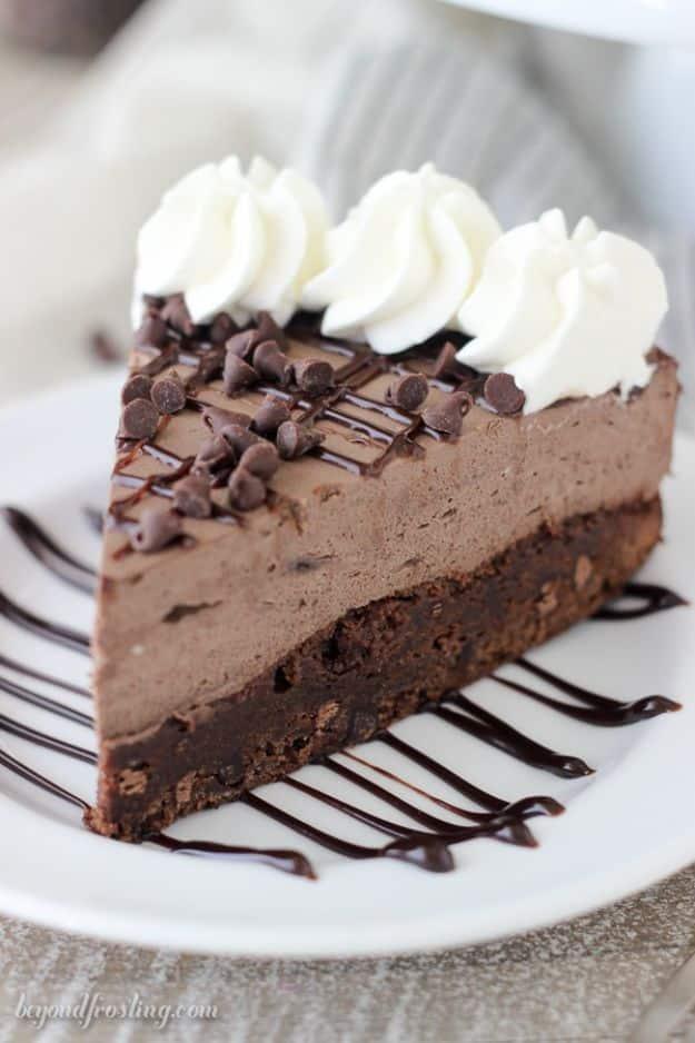 Chocolate mousse cake with a fudgy brownie bottom and chocolate curls on top, a rich birthday hybrid