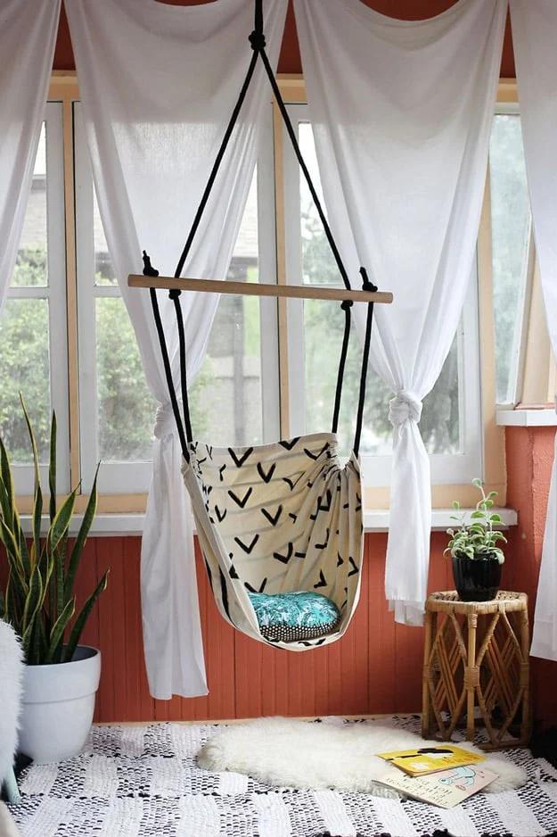 DIY crafts to make and sell: hanging hammock chair built from fabric, rope, and simple hardware for patios and porches