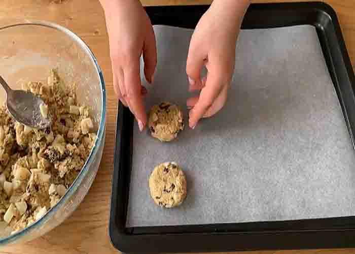Forming the oatmeal apple raisin cookies