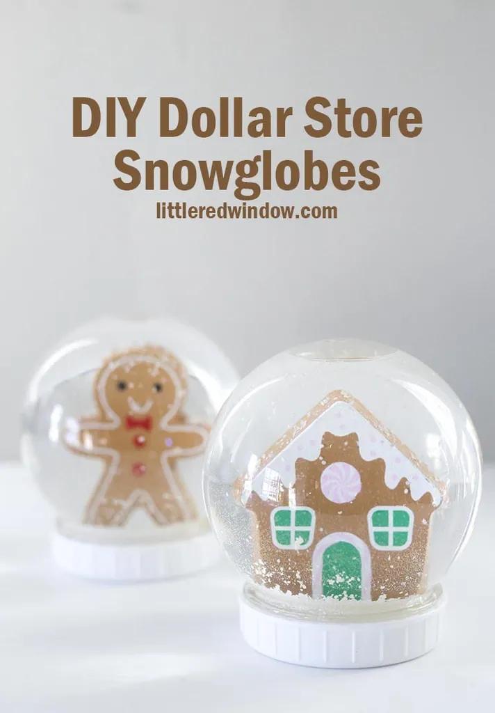 Two dollar store snow globes with a gingerbread man and a gingerbread house inside, white glitter snow settling on the bases