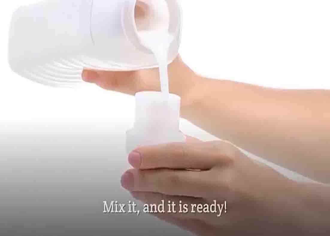 Mixing the ingredients to make the air freshener
