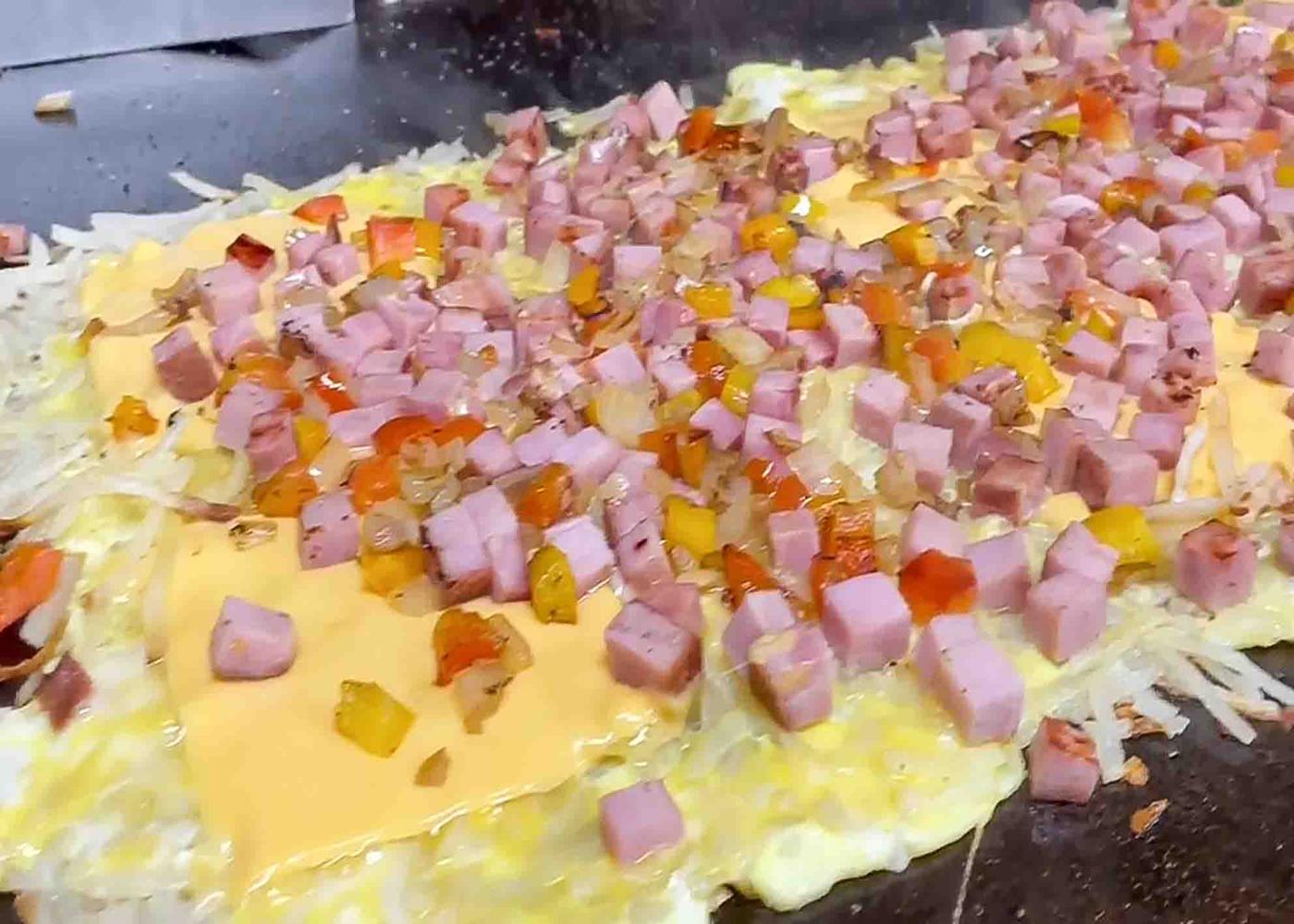 Hash brown omelet on griddle
