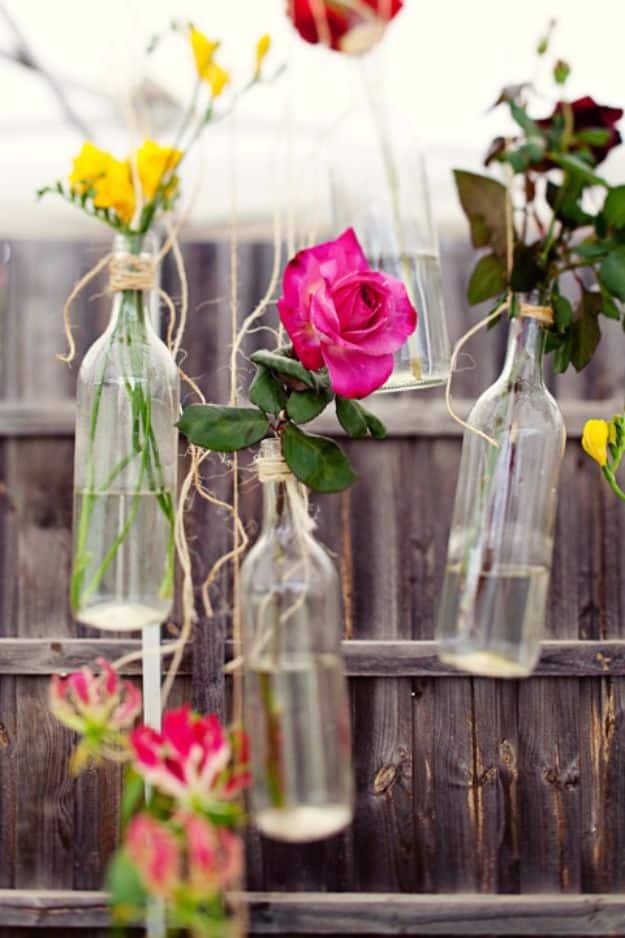 Old Wine Bottles Wedding Floral Arrangement, a rustic outdoor element, flexible enough to fit whatever materials are on hand