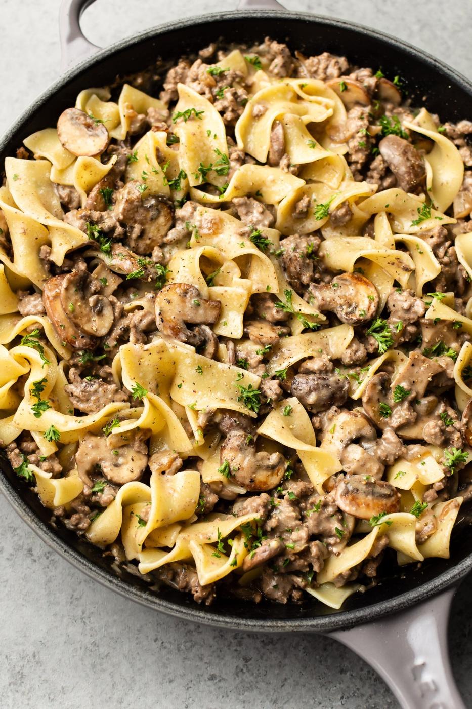 Beef and mushroom stroganoff with seared cremini mushrooms and ground beef in a creamy sour cream sauce