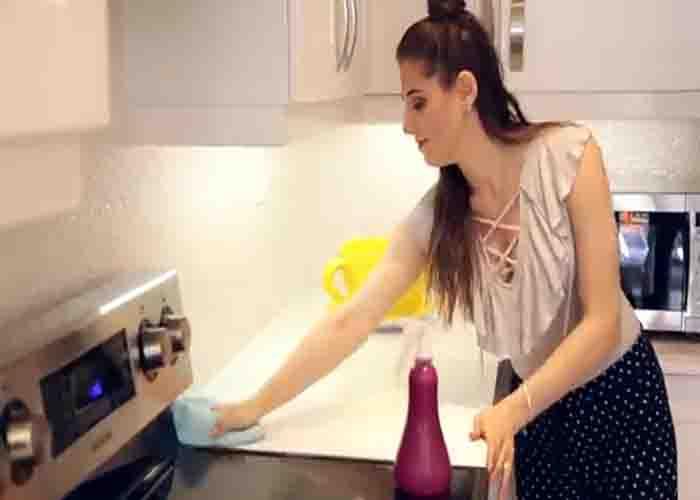 Cleaning the kitchen counters using dish soap