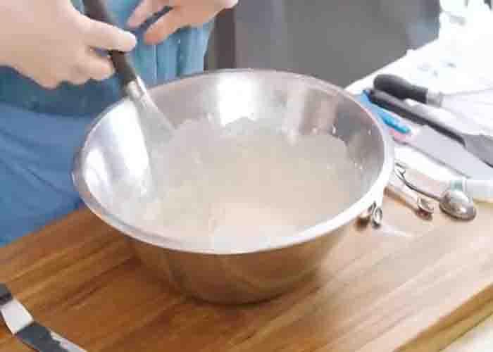 Making the batter for the old-fashioned fried chicken recipe