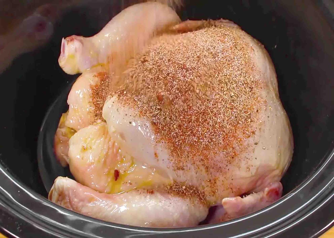 Rubbing the spice mixture to the chicken