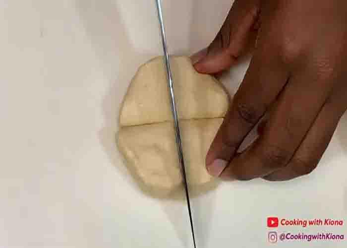 Chopping the Pillsbury biscuit bites into small pieces