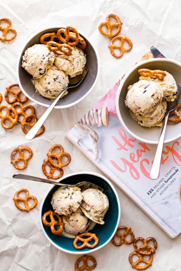 Salted pretzel ice cream with chocolate and peanut butter swirls in a loaf pan, a salty sweet frozen dessert