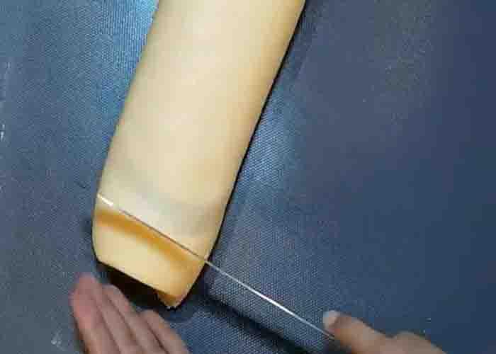 Cutting the custard roll pieces