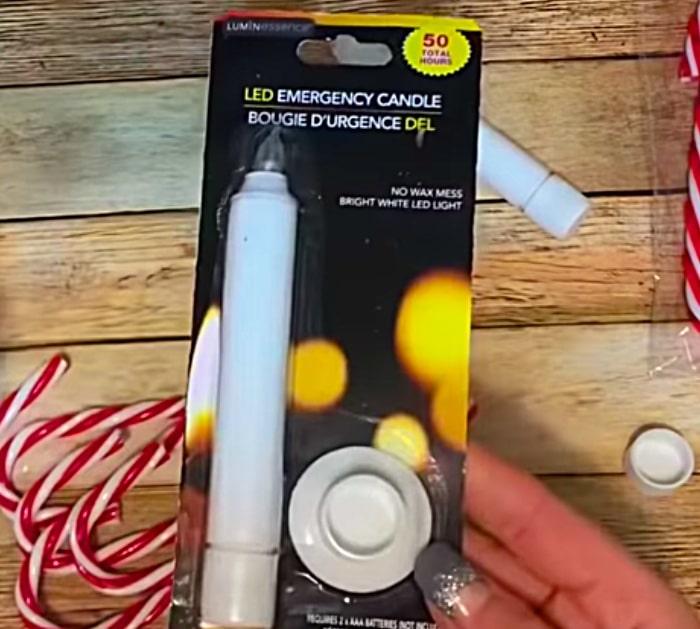 Learn to make a cheap DIY Candy Cane Luminary from Dollar Tree