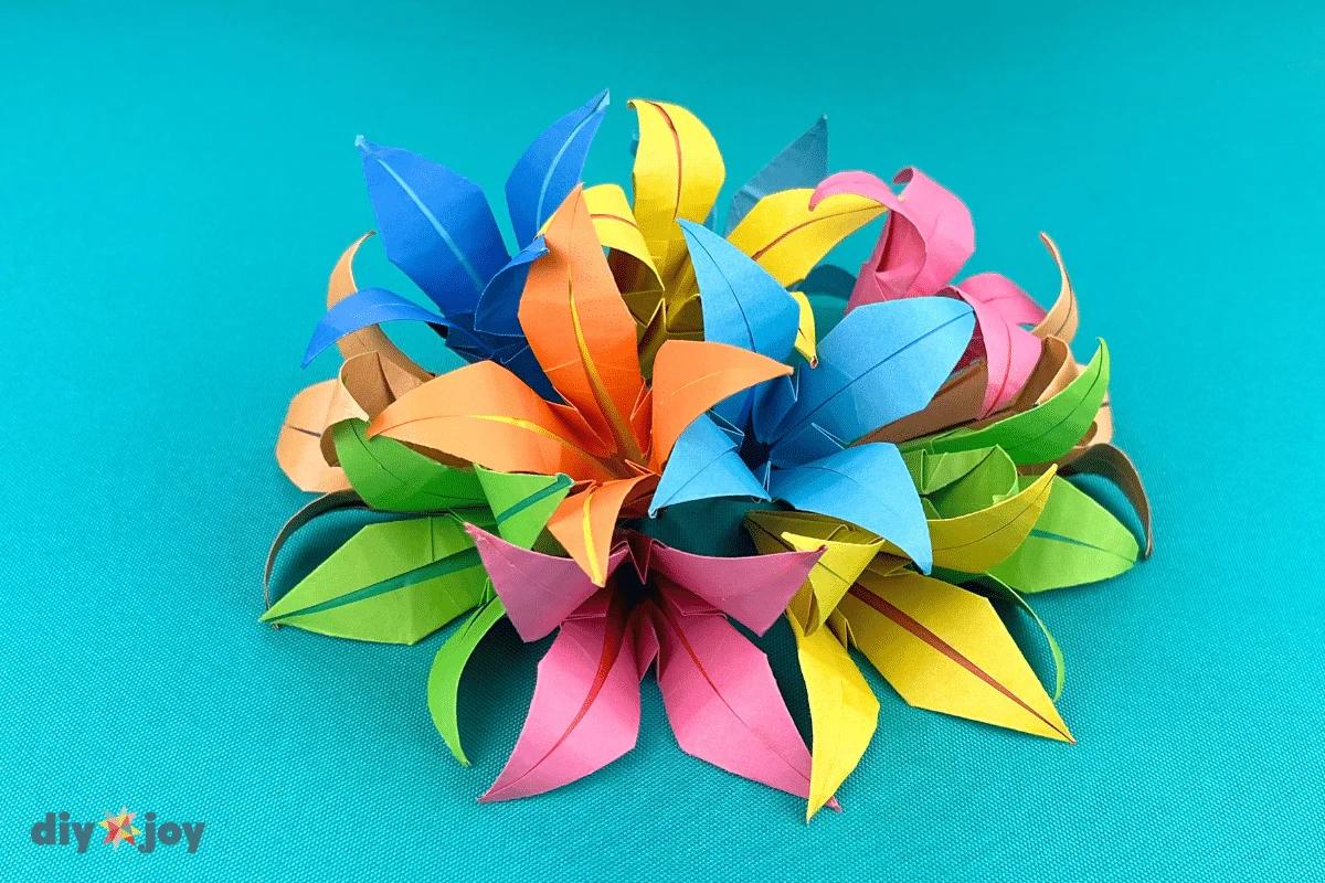 Paper flowers folded as origami paper lilies and gathered into a small bouquet, the finished lily paper craft
