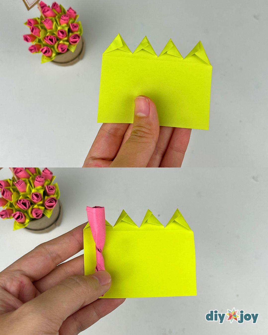 Fringed sticky note held in a hand next to a rolled paper rose bud, a simple Post-it note flower craft