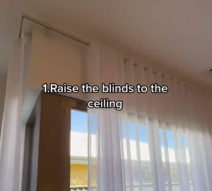 Raise the curtains to the ceiling