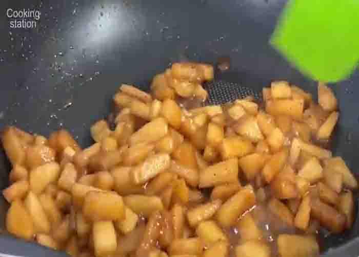 Caramelizing the apples for the apple cinnamon cake recipe