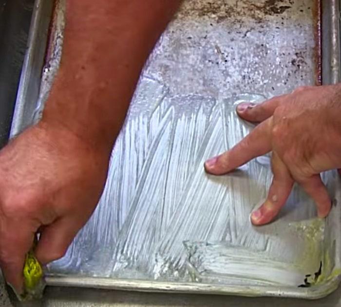 Clean a sheet pan cookie sheet with Easy Off Oven Cleaner