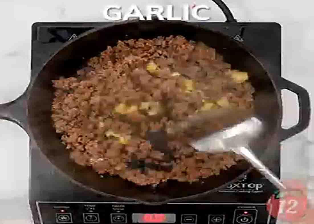 Cooking the ground beef for the Mongolian ground beef noodles recipe