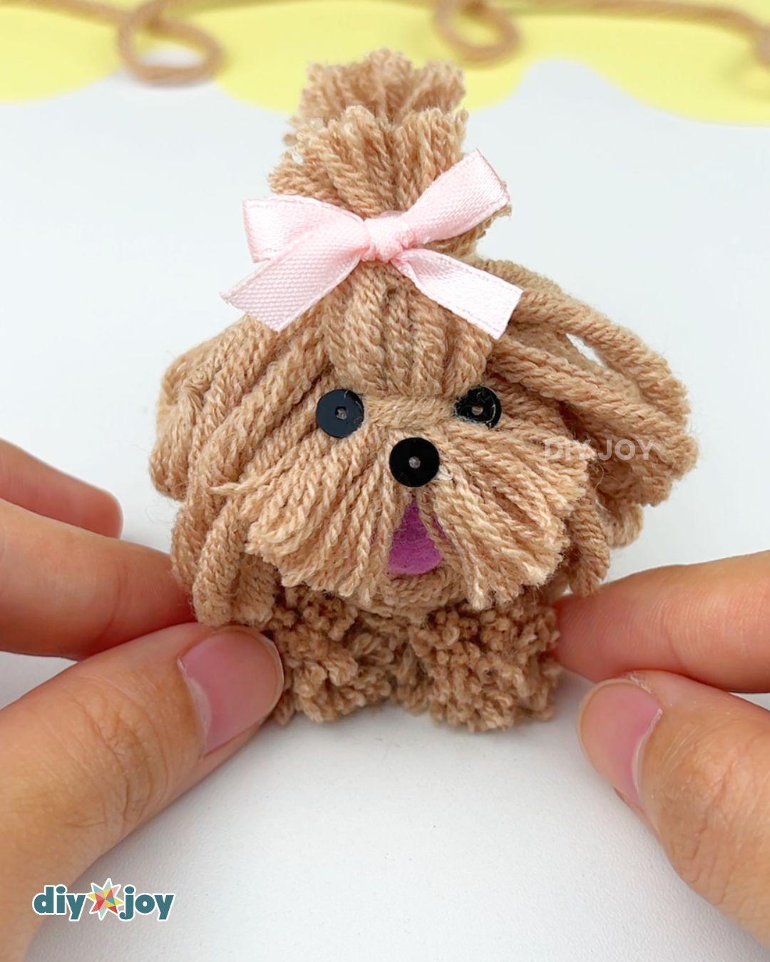 Homemade Yarn Dog Keychain — glue the details