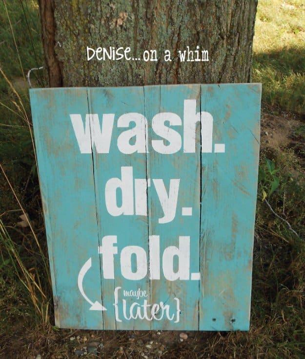 Laundry Room Pallet Sign, a budget friendly project using an old pallet and a charming handmade sign for a porch or wall