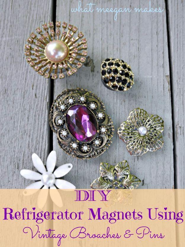 Sparkling vintage brooches glued onto fridge magnets, rhinestones and enamel flowers, country crafts from old finds