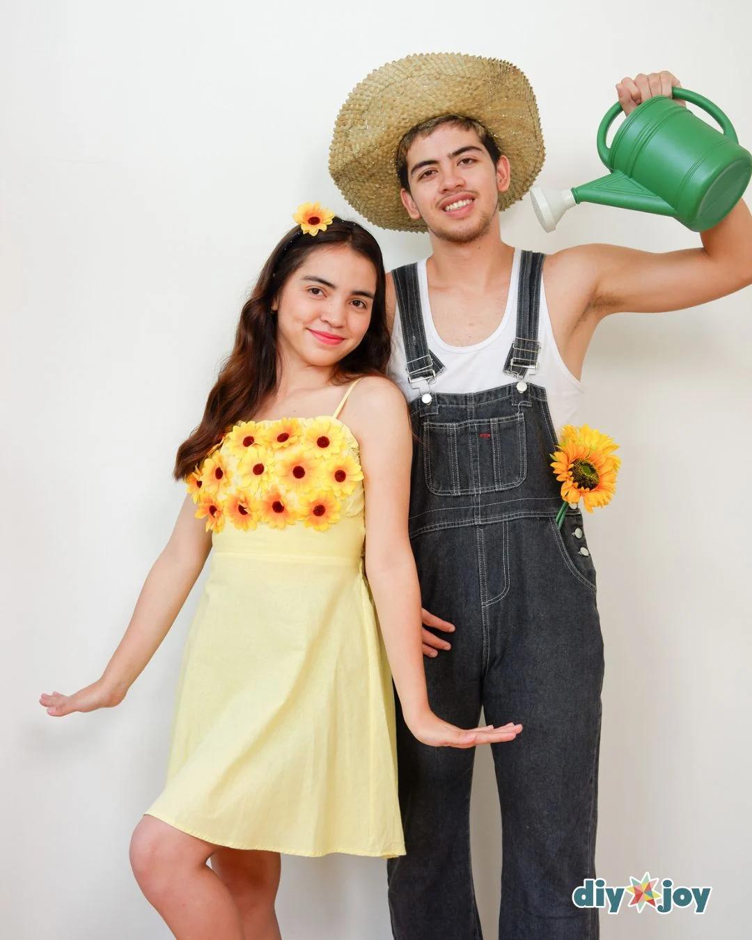 Sunflower and gardener couples costume with a yellow dress trimmed in sunflowers, denim overalls and a straw hat