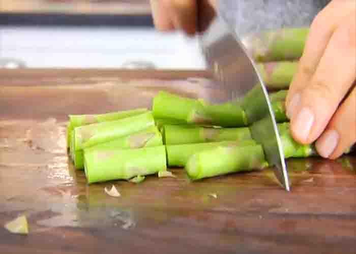 Cutting the asparagus for the soup recipe