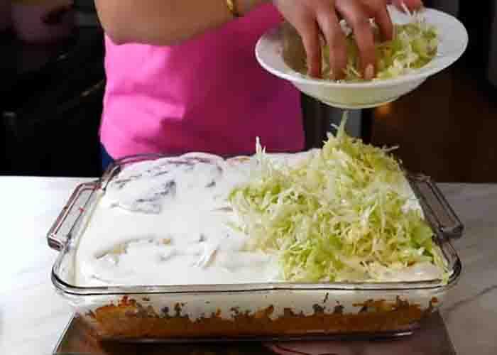 Layering the ground beef taco casserole