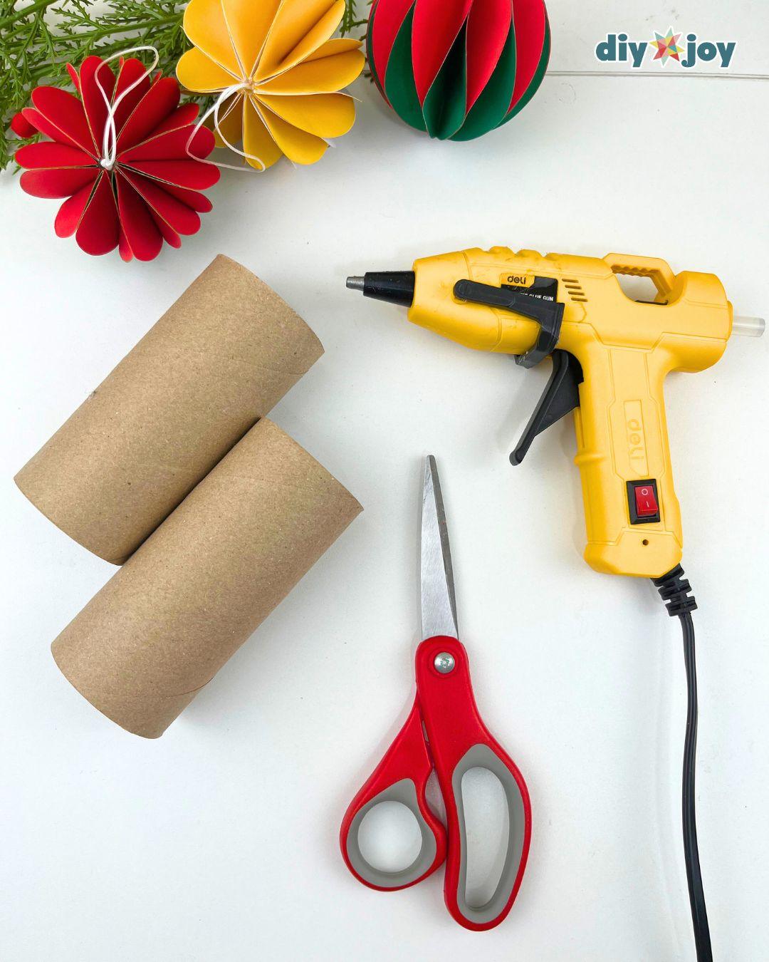 Christmas Ornaments Snowflake Toilet Paper Tubes — adding a string