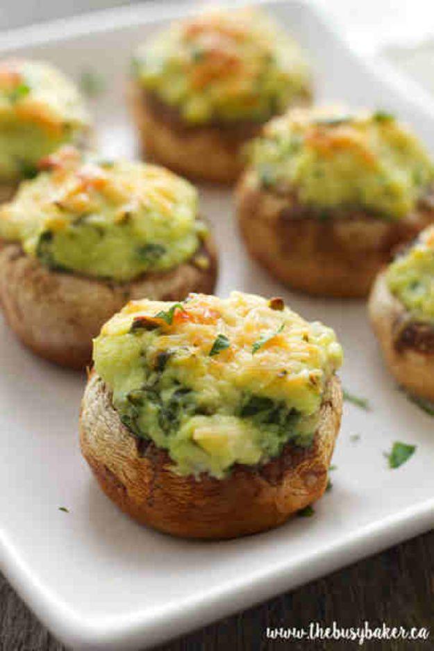 Spinach and ricotta stuffed mushrooms baked golden in a dish, filled with creamy ricotta and parmesan