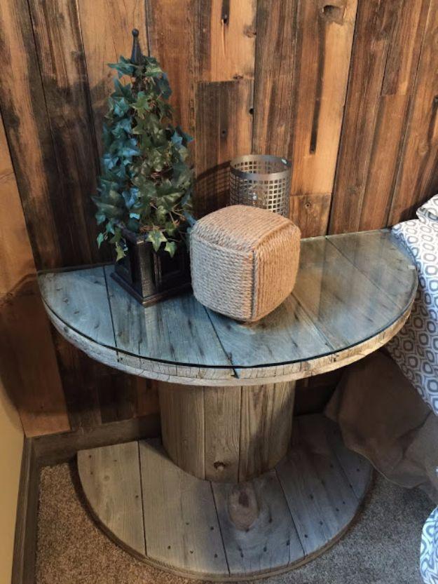 Wooden Electrical Spool Table Turned into a Bedside Nightstand, a stylish accent piece beside the bed