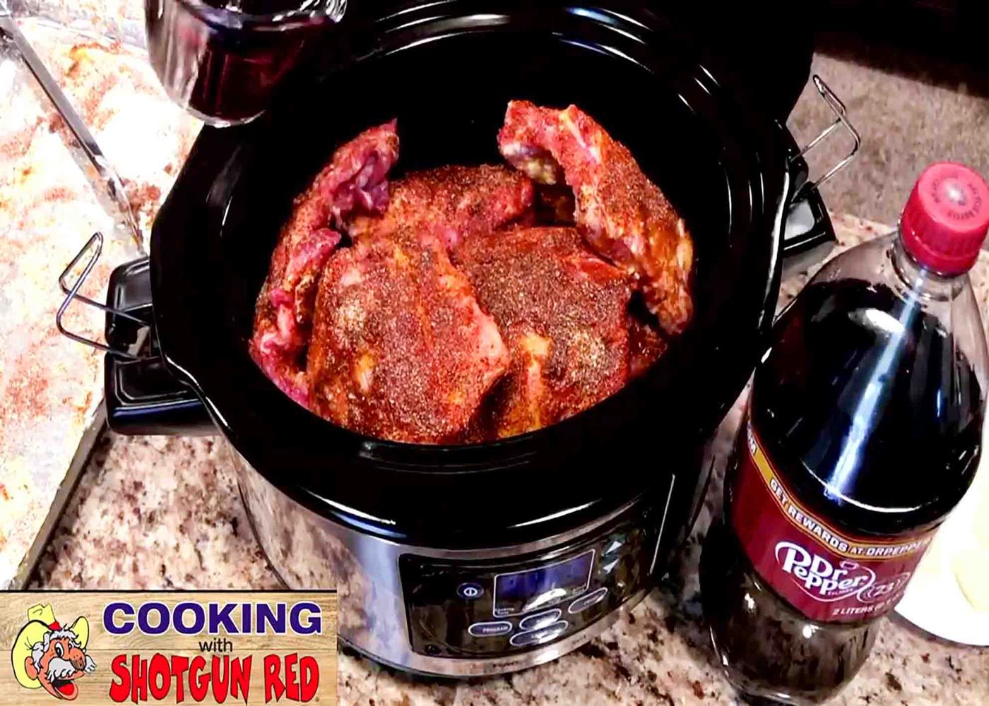 Pouring in the secret ingredient, which is Dr. Pepper over the meat