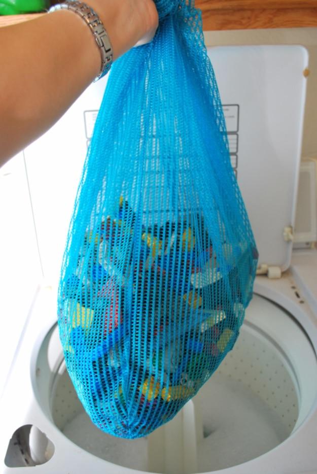 Use Mesh Bags To Wash Toys, simple enough for even a first attempt to work and the trick that finally makes the task painless