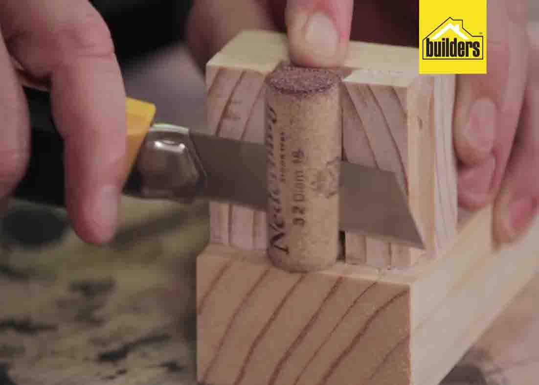 Cutting the wine corks into equal sizes