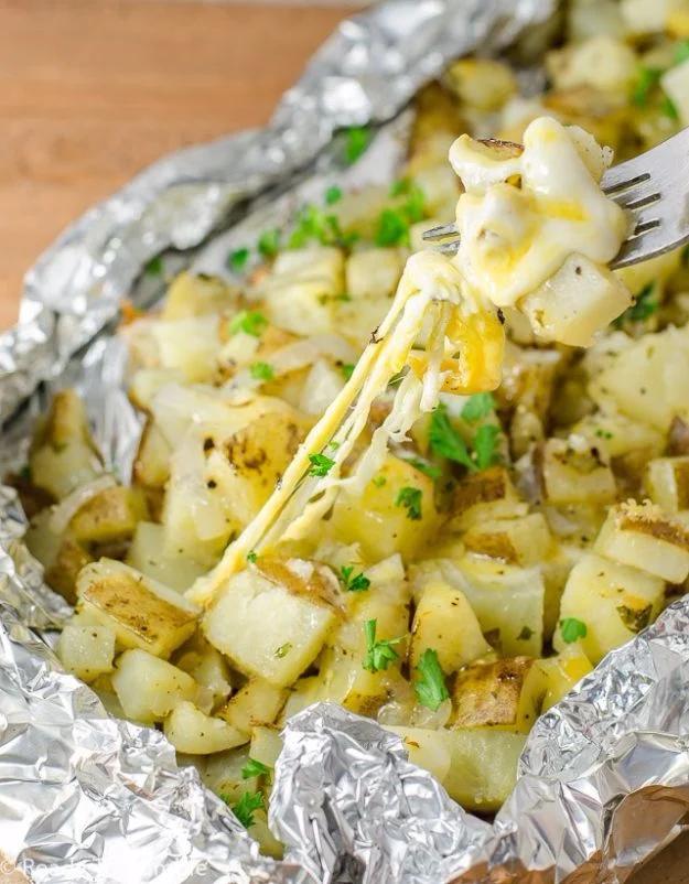 Grilled Cheesy Garlic Potatoes, a campsite dinner idea, light on prep but big on payoff and a bite worth saving room for