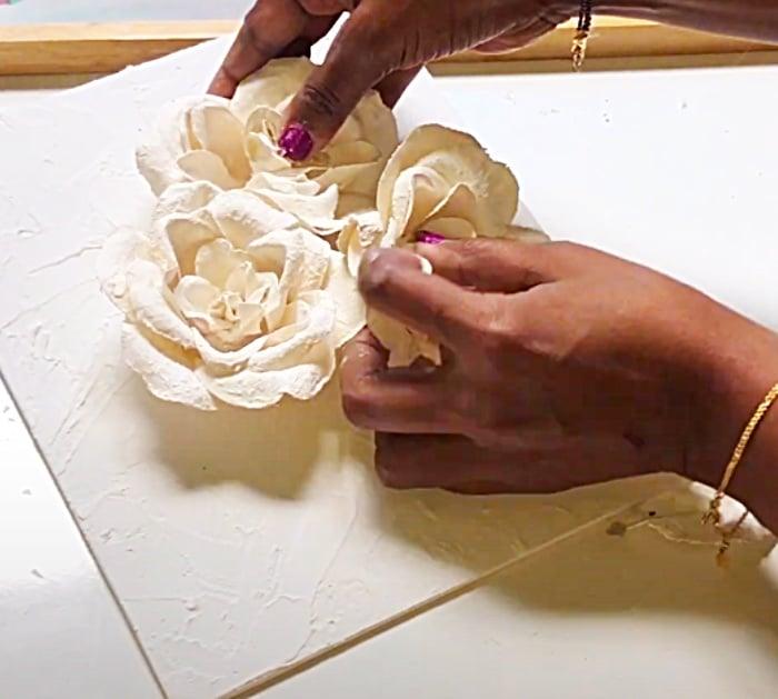 Cover Faux Flowers In Caulk To Make A Wall Art Floral Sculpture