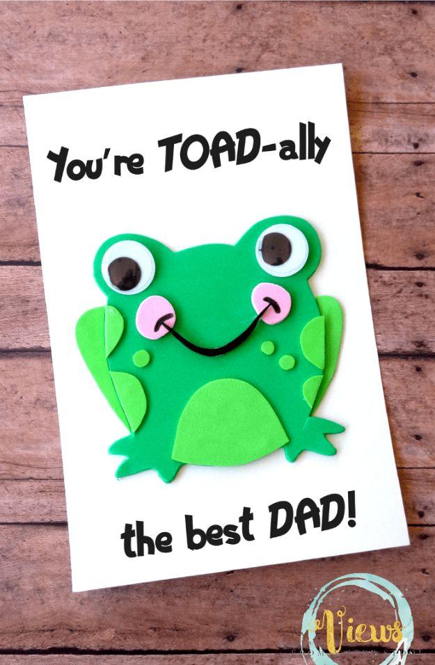 Toad-ally awesome Father's Day card with a green craft foam frog, googly eyes and pink cheeks on white paper