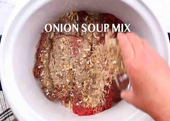 Putting all the cube steak ingredients in the crockpot
