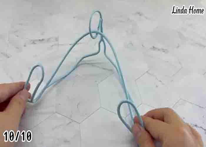 Making a book stand using a wire hanger