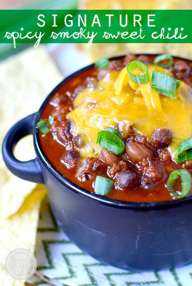 Graphic reading Signature Spicy Smoky Sweet Chili above a navy pot of chili with melted cheddar on top