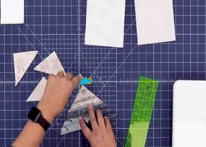 Trimming the block units for the lemon star quilt