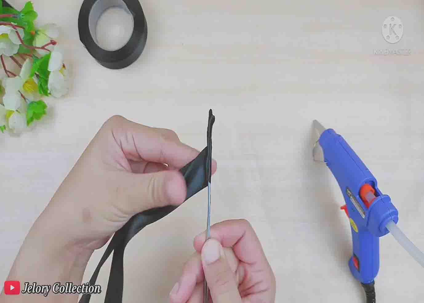Wrapping the wire with ribbon for the hair bun maker