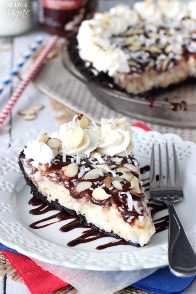 Almond Joy pie with a creamy coconut filling and chocolate topping with almonds in a cookie crumb crust