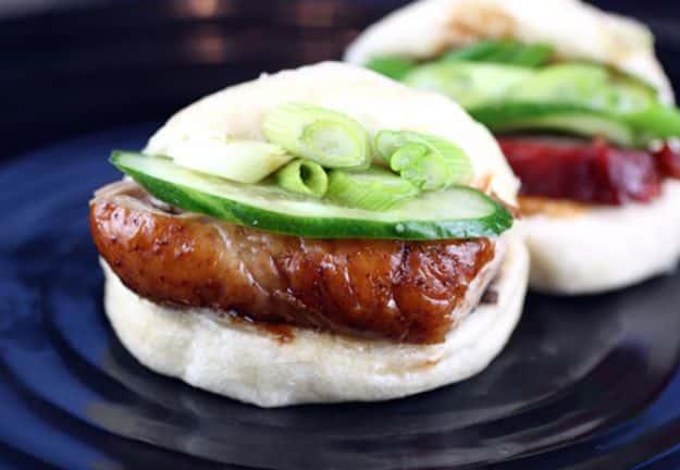 Soft steamed buns made from canned biscuits filled with pork and scallions, a fusion cooking technique