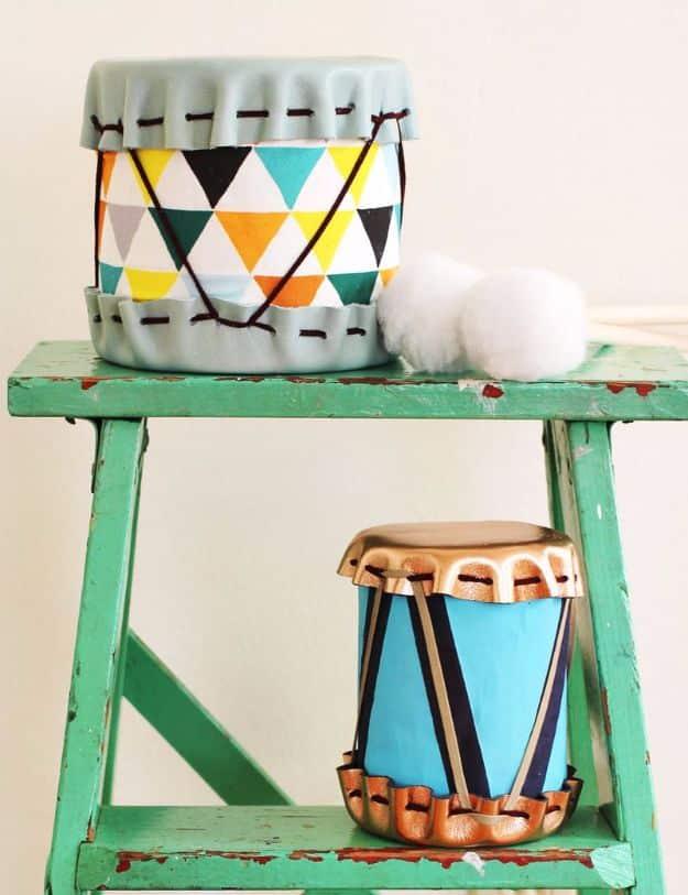 Tin Can Drums, budget friendly using stuff already sitting in a bin and a sweet way to personalize a plain space