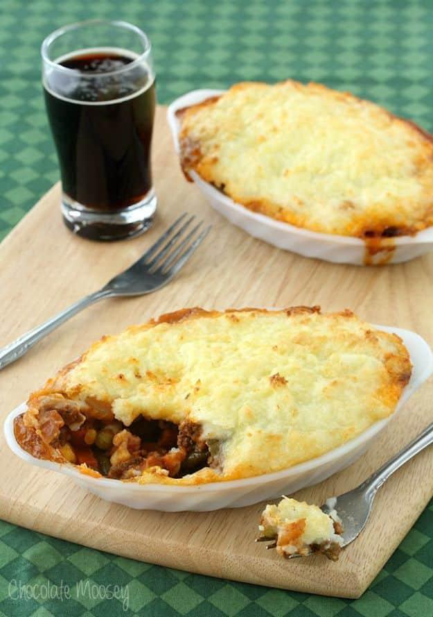 Guinness shepherd's pie for two in a small dish with beef and vegetable gravy under browned mashed potato
