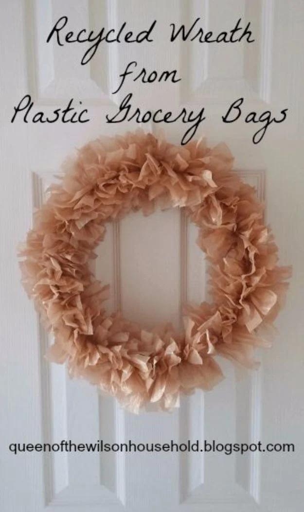 Ruffled wreath made from tan plastic grocery bag squares on a white door, under a handwritten title graphic