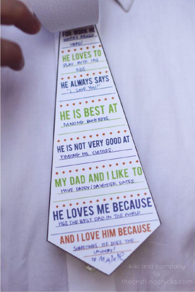 Printable paper necktie card filled in by a child with answers about dad, worn over a white dress shirt